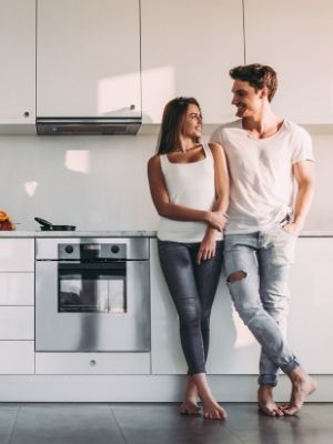 Couple sitting on counter